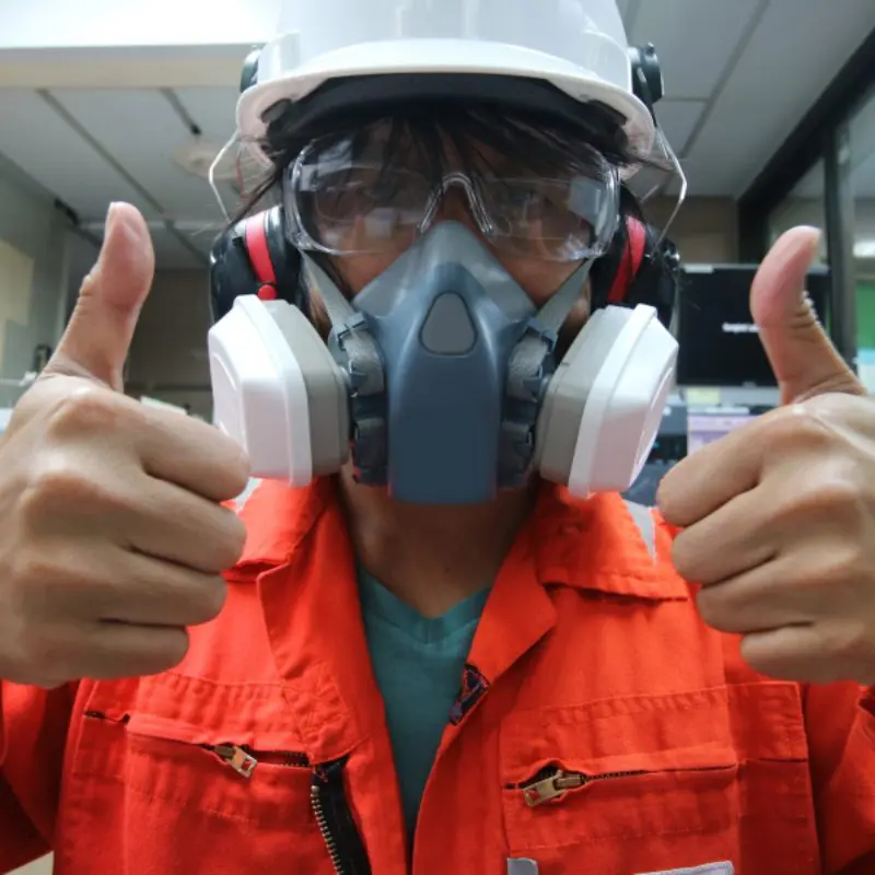 Safety-conscious worker in orange attire