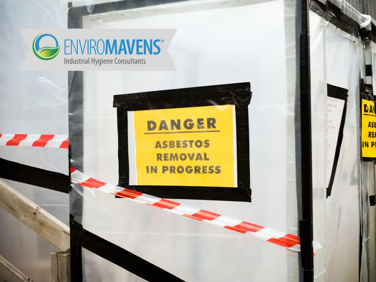 Industrial site with asbestos danger sign