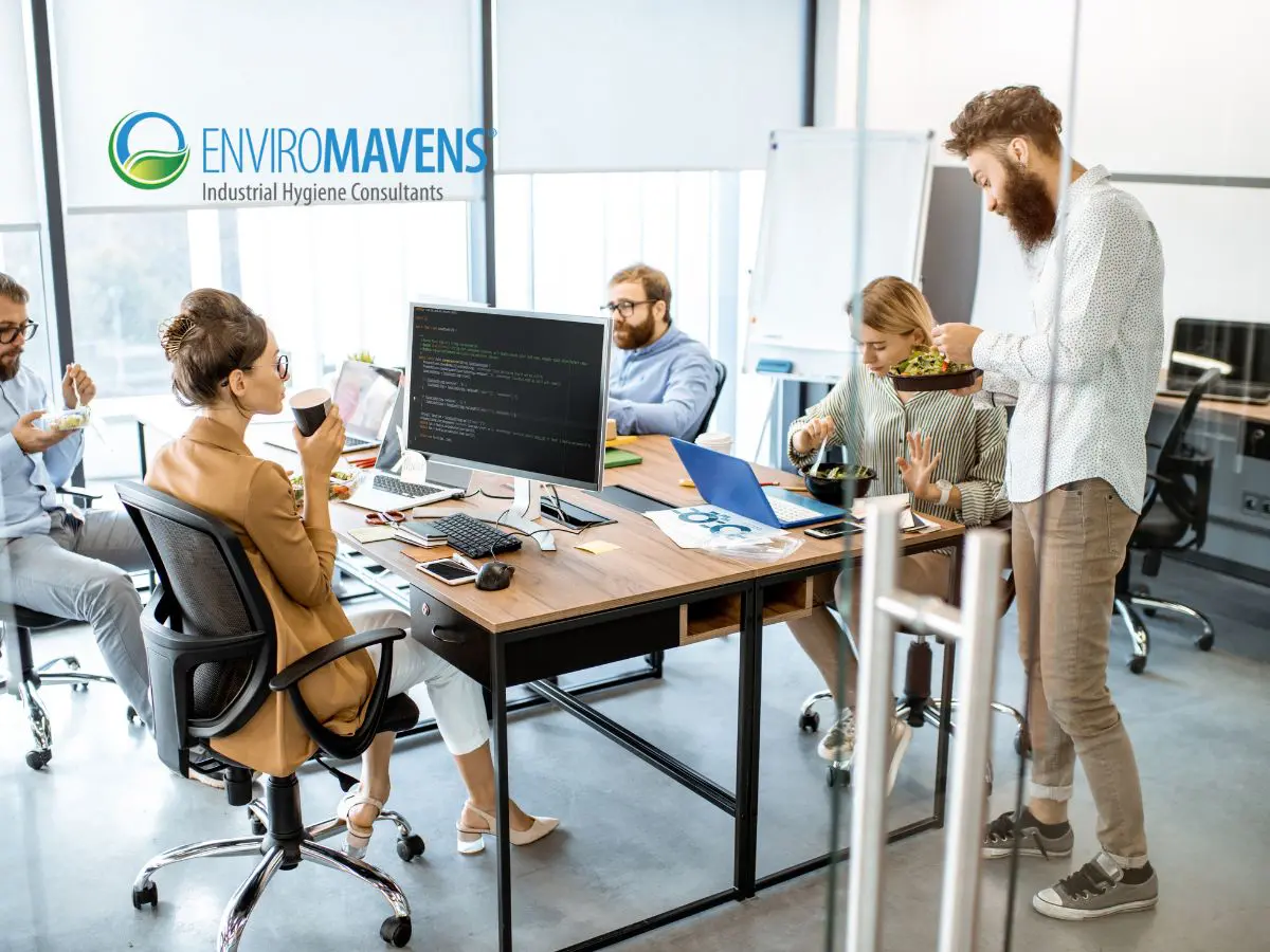 Colleagues working together in modern office
