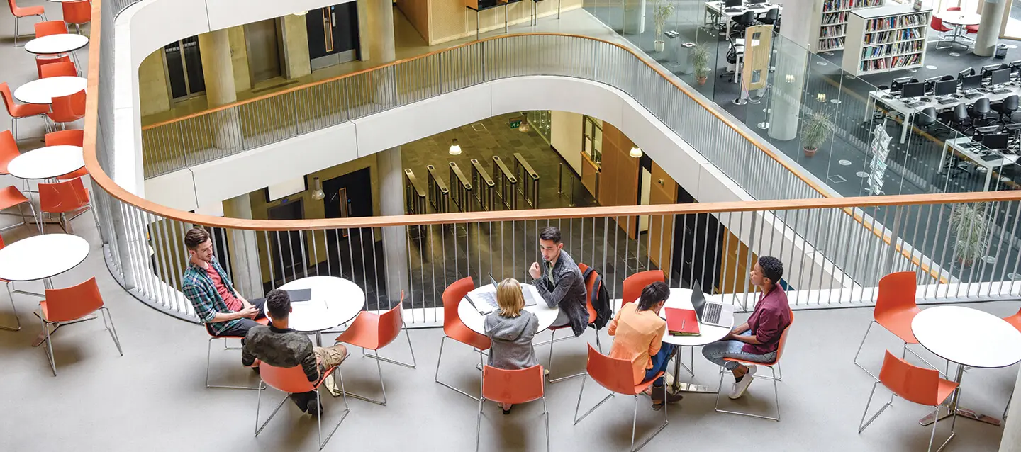 Students discussing in a university study area