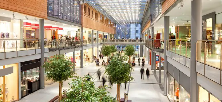 Spacious mall with glass ceiling