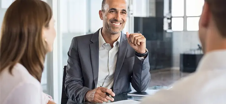 Confident businessman in office meeting