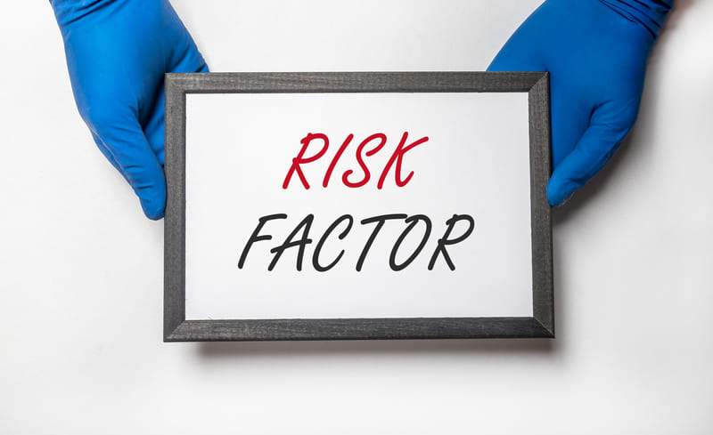 "Risk Factor" written on a white board