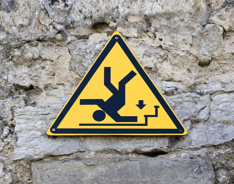 A Caution Sign Depicting a Falling Man, Warning of Potential Hazards in Tullahoma, TN