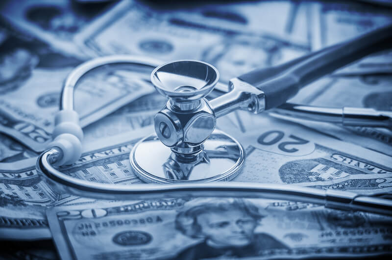 A Stethoscope on a Stack of Money Symbolizeds Industrial Healthcare in Tullahoma, TN