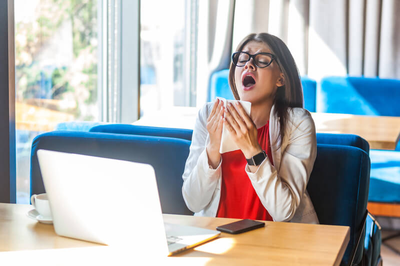 A woman working with allergies