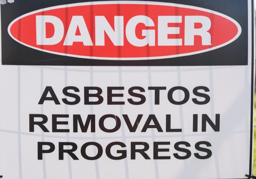 Asbestos removal warning sign displayed